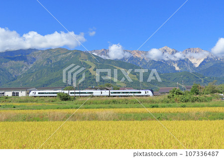 Oito Line Limited Express Azusa going to the foot of Mt. Hakuba in autumn Oito Line Limited Express Azusa going to the foot of Mt. Hakuba in autumn 107336487