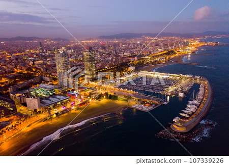 Night aerial view from drones of coast in Barcelona with sea 107339226