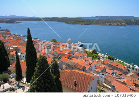 Sibenik, a town on the Adriatic coast of Croatia, the Cathedral of St. James, a world heritage site, and the old town seen from St. Michael's Fortress Sibenik, a town on the Adriatic coast of Croatia, the Cathedral of St. James, a world heritage site, and the old town seen from St. Michael's Fortress 107339400