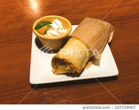 Assorted crepe and ice cream dessert 107339407