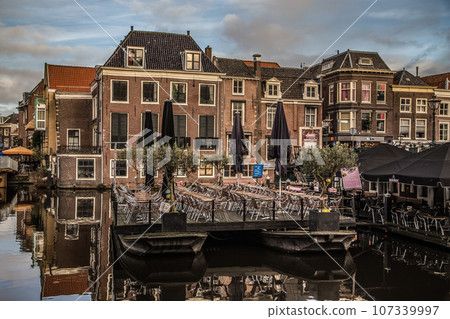 Cityscape of Amsterdam, old type buildings and channels Cityscape of Amsterdam, old type buildings and channels 107339997