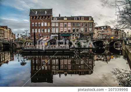 Cityscape of Amsterdam, old type buildings and channels Cityscape of Amsterdam, old type buildings and channels 107339998