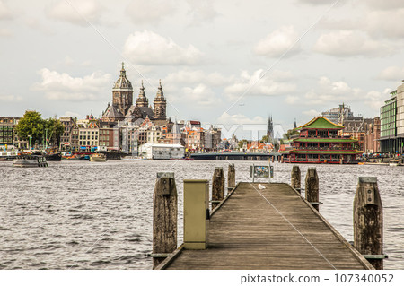 modern Amsterdam city center, canals and bridges. modern Amsterdam city center, canals and bridges. 107340052