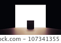 A black box in front of a wall of light 107341355