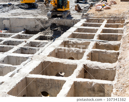 Material video: Building demolition work site, underground demolition 107341382