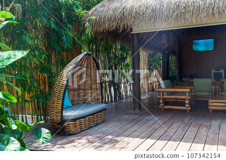 heavenly vacation on phi phi don island in thailand in a hotel with bamboo bungalow among palm trees heavenly vacation on phi phi don island in thailand in a hotel with bamboo bungalow among palm trees 107342154
