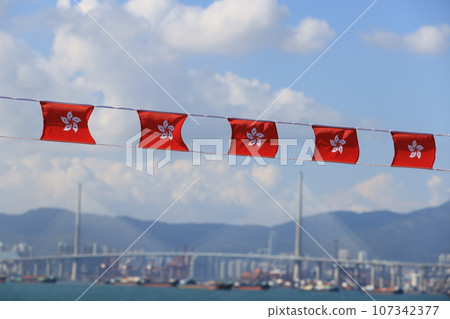 hong kong flag set up in the event for celebrating the National Day of the People's Republic of China 74 th anniversary in market of Sheung Wan, Hong Kong hong kong flag set up in the event for celebrating the National Day of the People's Republic of China 74 th anniversary in market of Sheung Wan, Hong Kong 107342377