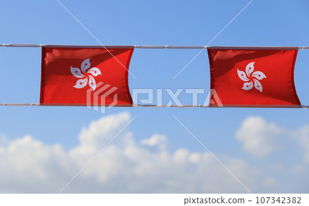 hong kong flag set up in the event for celebrating the National Day of the People's Republic of China 74 th anniversary in market of Sheung Wan, Hong Kong hong kong flag set up in the event for celebrating the National Day of the People's Republic of China 74 th anniversary in market of Sheung Wan, Hong Kong 107342382