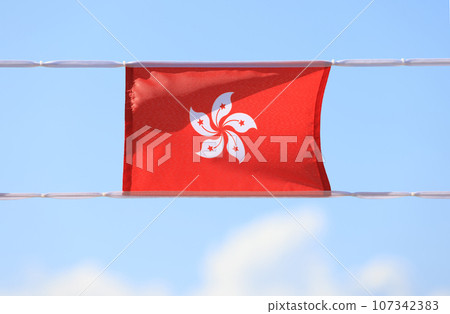 hong kong flag set up in the event for celebrating the National Day of the People's Republic of China 74 th anniversary in market of Sheung Wan, Hong Kong hong kong flag set up in the event for celebrating the National Day of the People's Republic of China 74 th anniversary in market of Sheung Wan, Hong Kong 107342383