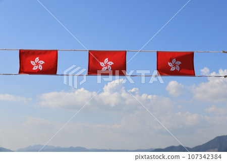 hong kong flag set up in the event for celebrating the National Day of the People's Republic of China 74 th anniversary in market of Sheung Wan, Hong Kong hong kong flag set up in the event for celebrating the National Day of the People's Republic of China 74 th anniversary in market of Sheung Wan, Hong Kong 107342384