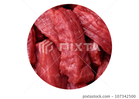 Raw organic meat beef or lamb cut into slices with salt, spices and herbs Raw organic meat beef or lamb cut into slices with salt, spices and herbs 107342500