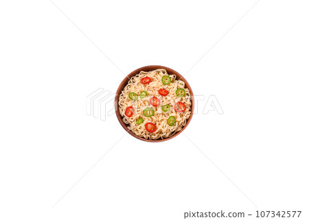 Delicious Asian cuisine dish with rice noodles, peppers, mushrooms and spices 107342577