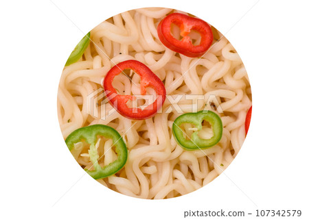 Delicious Asian cuisine dish with rice noodles, peppers, mushrooms and spices 107342579