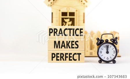 Practice makes perfect symbol. Concept words Practice makes perfect on wooden block. Beautiful white table white background. Black alarm clock. Business practice makes perfect concept. Copy space. Practice makes perfect symbol. Concept words Practice makes perfect on wooden block. Beautiful white table white background. Black alarm clock. Business practice makes perfect concept. Copy space. 107343683