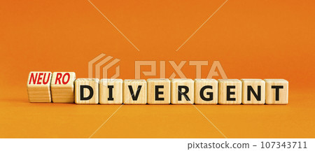 Divergent or neurodivergent symbol. Concept words Divergent Neurodivergent on wooden blocks. Beautiful orange table orange background. Divergent or neurodivergent concept. Copy space. 107343711