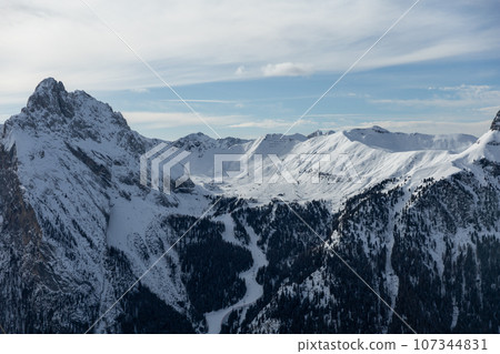 Winter Italy Dolomite mountains covered with snow  107344831