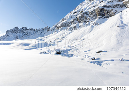 Winter Italy Dolomite mountains covered with snow  107344832