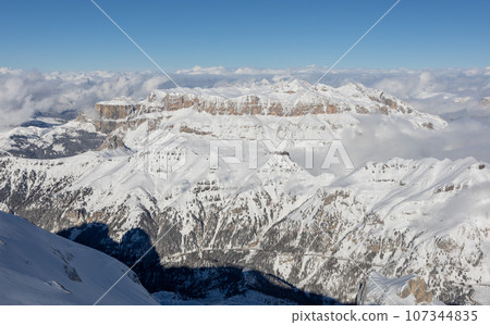 Winter Italy Dolomite mountains covered with snow  107344835