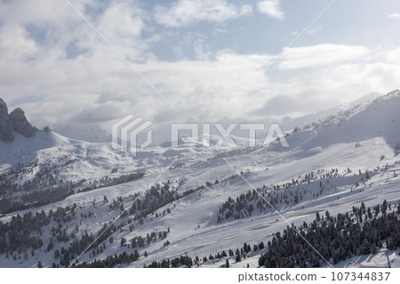 Winter Italy Dolomite mountains covered with snow Winter Italy Dolomite mountains covered with snow 107344837