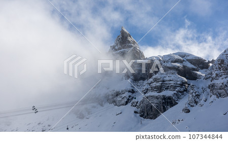 Winter Italy Dolomite mountains covered with snow  107344844