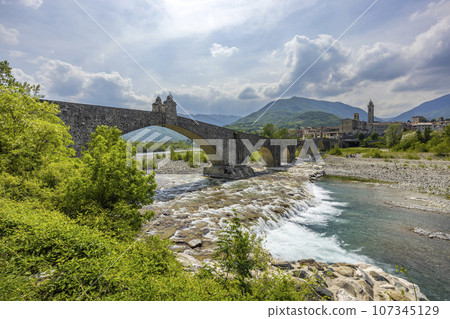 Gobbo Bridge also Devil Bridge or Ponte del Diavolo or Ponte Gobbo in Bobbio, Piacenza province, Trebbia Valley, Emilia Romagna, Italy 107345129