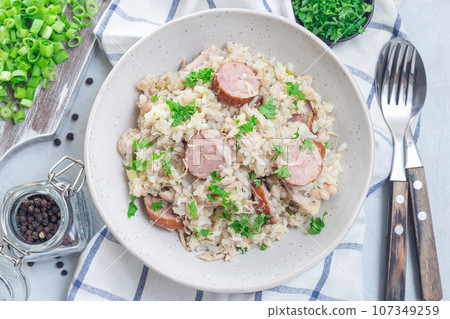 South Carolina chicken bog dish with smocked sausages, horizontal, top view 107349259
