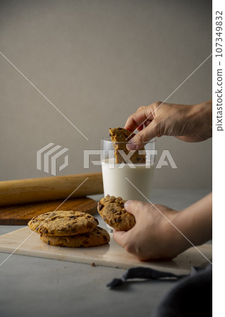 hand, milk, cookie 107349832