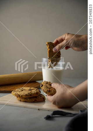 hand, milk, cookie 107349833
