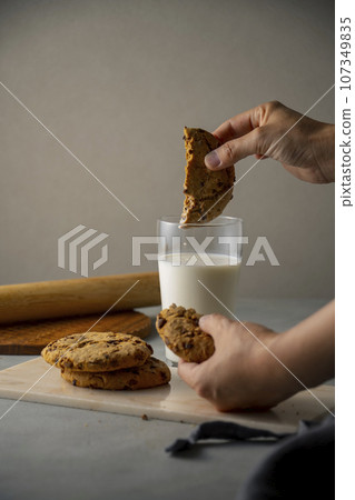 hand, milk, cookie 107349835
