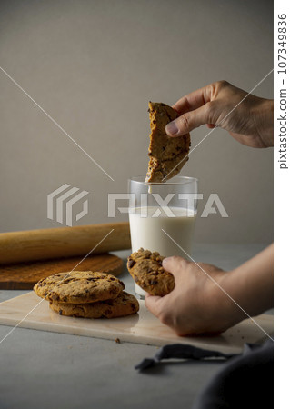 hand, milk, cookie 107349836