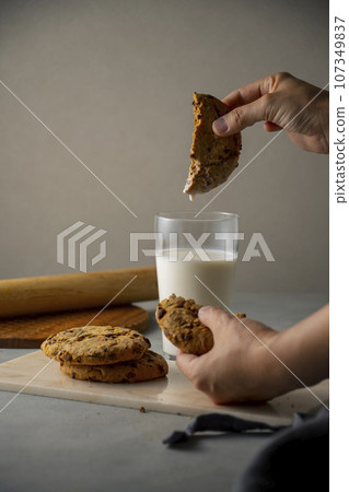 hand, milk, cookie 107349837