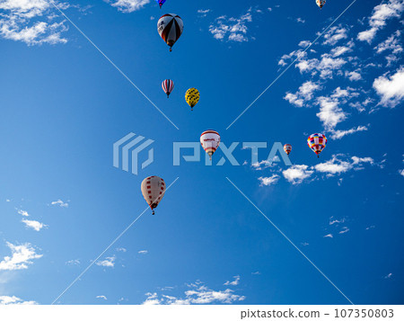Hot air balloon floating in the sky 107350803