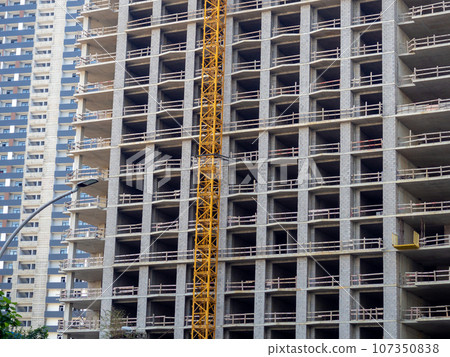 High-rise construction. Skyscraper under construction. Housing frame. Multi-apartment housing. Building cranes. Batumi. New area. High-rise construction. Skyscraper under construction. Housing frame. Multi-apartment housing. Building cranes. Batumi. New area. 107350838