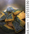 Chestnut pumpkin in a pot 107355590