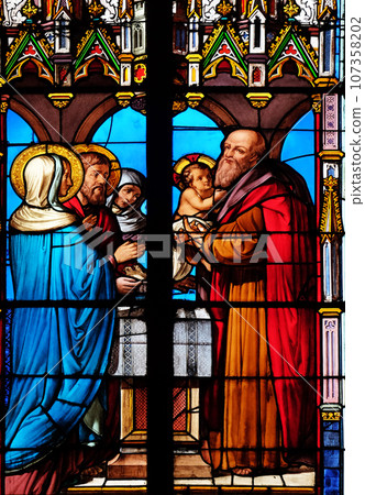 Presentation of Jesus at the Temple, stained glass windows in the Saint Eugene - Saint Cecilia Church, Paris, France 107358202
