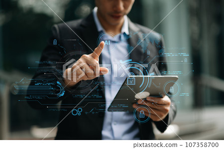 Cyber security and data protection. Business using computer and tablet protecting business and financial data with virtual from cyber attack, cybersecurity technology in modern office. Cyber security and data protection. Business using computer and tablet protecting business and financial data with virtual from cyber attack, cybersecurity technology in modern office. 107358700