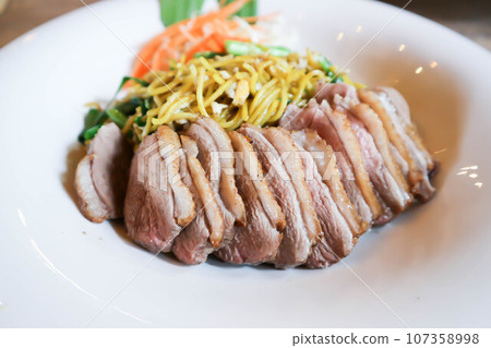 noodles with roasted duck 107358998