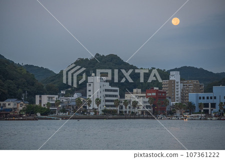 Harvest moon floating in Katakami Bay, Hinase, Bizen City, Okayama Prefecture, Japan Harvest moon floating in Katakami Bay, Hinase, Bizen City, Okayama Prefecture, Japan 107361222