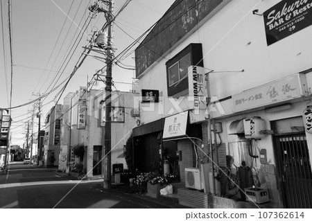 Entertainment district in front of Fussa Station 107362614