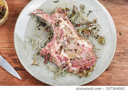 Raw pork steak Tomahawk 107364091