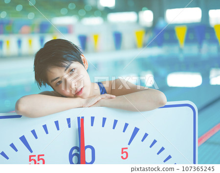 A scene of a swimmer in the pool A scene of a swimmer in the pool 107365245