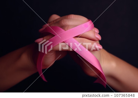 a pink ribbon symbol, symbolizing solidarity and awareness for Cancer 107365848