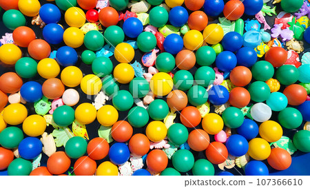 Colorful balls balls toys in the children's pool in the game park. 107366610
