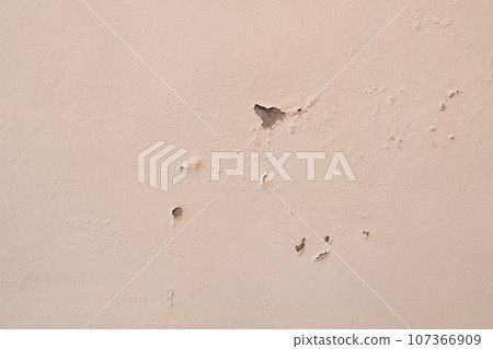 beige mediterranean old wall plaster rough texture background 107366909