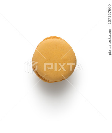 Orange french macaron top view isolated on white with shadow Orange french macaron top view isolated on white with shadow 107367660