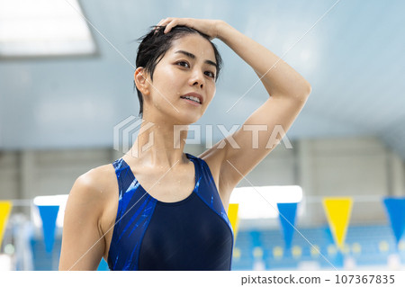 woman going to the pool woman going to the pool 107367835