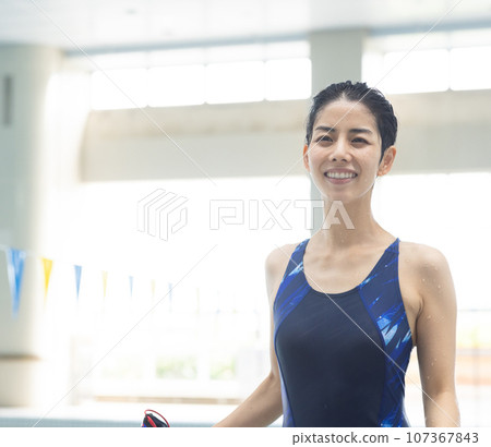 woman going to the pool woman going to the pool 107367843