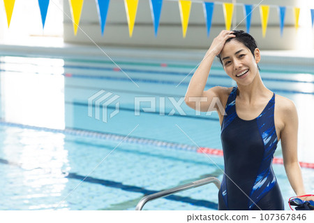 woman going to the pool woman going to the pool 107367846