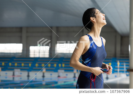 pretty woman going to the pool pretty woman going to the pool 107367906