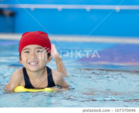 cute girl going to the pool 107370046